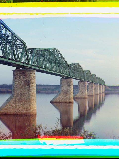 trans-siberian-railway-metal-truss-bridge-on-stone-piers-over-the-kama-river-near-perm-ural-mountains-region-loc_9628195675_o